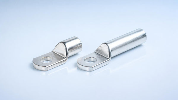 Short barrel and long barrel tin-plated copper compression lugs side by side | Conversions Tech