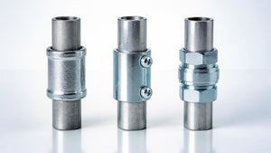 Threaded rigid, EMT set-screw and EMT compression couplings side by side | Conversions Tech